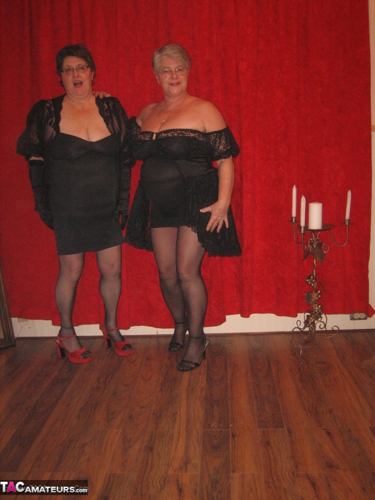 Big titted granny Girdle Goddess and her lesbian girlfriend don strapon cocks  